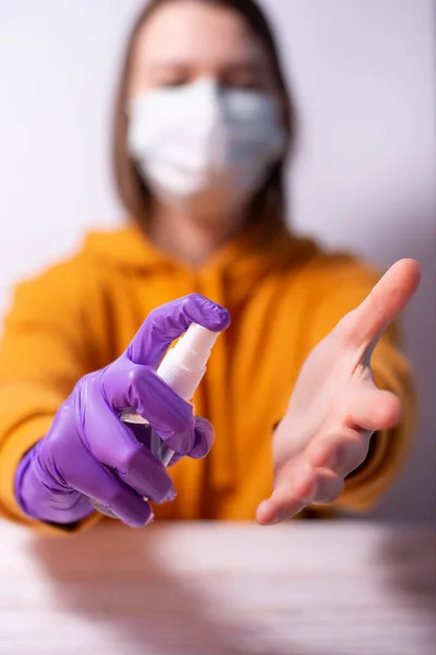 Spray for cleaning and Disinfecting hands, woman hand holding sa