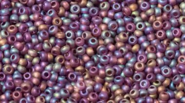 Dur hareketi, bir sürü cam tohumu boncuğu, desenli desen.