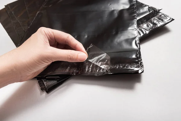 Conjunto Sobres Polietileno Negro Sobre Fondo Gris — Foto de Stock