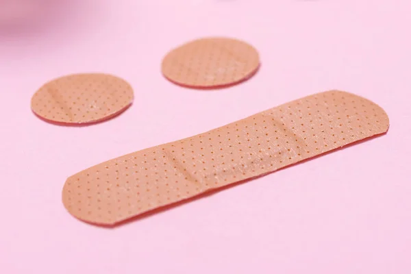 Set Adhesive Bandage Medical Sticking Plaster Pink Backgr — Stock Photo, Image