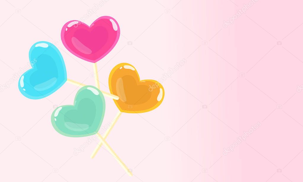  Cute heart lollipop candy on a pink background 