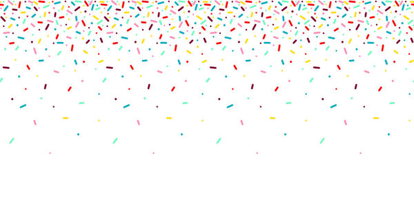 Seamless pattern with rainbow, colorful falling decorative sprin