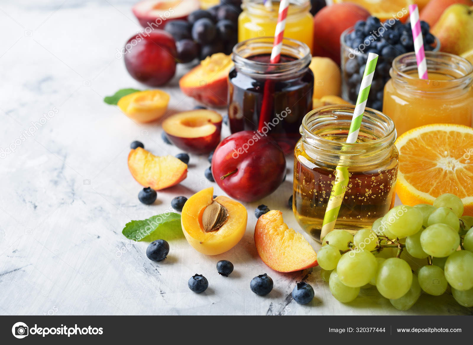 Various types of fruit juice Stock Photo by 320377444
