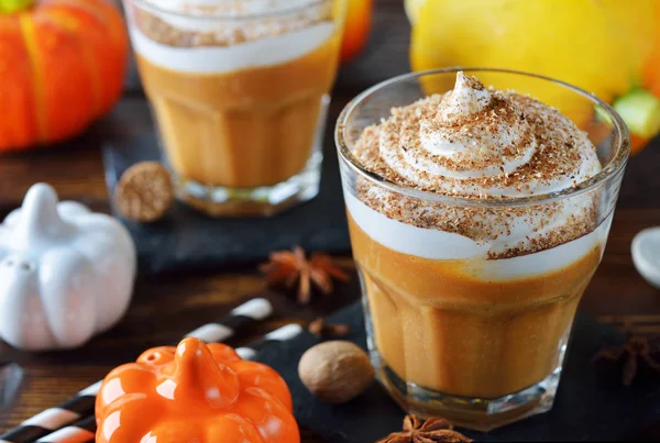 Spicy pumpkin latte decorated whipped cream