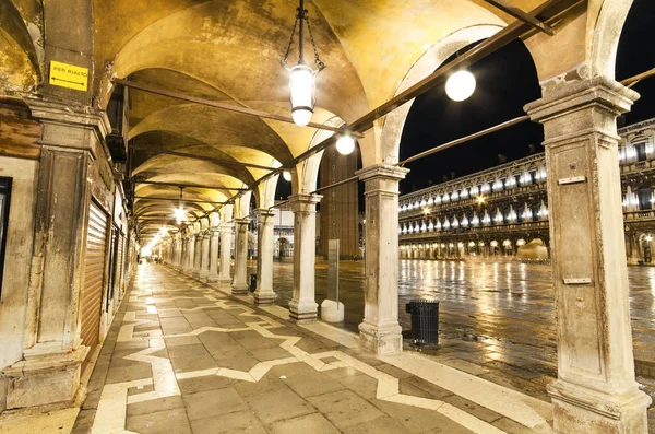 Archway at night in St Marco square, Venice, Italy. Stock Picture