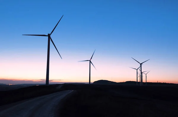 Wind farm shilouette at dusk — Stock Photo, Image