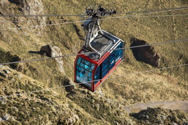 Fuente De, Spain - February 17, 2017 : Cable Car in Fuente de, Picos de Europa mountains, Cantabria, Spain. clipart