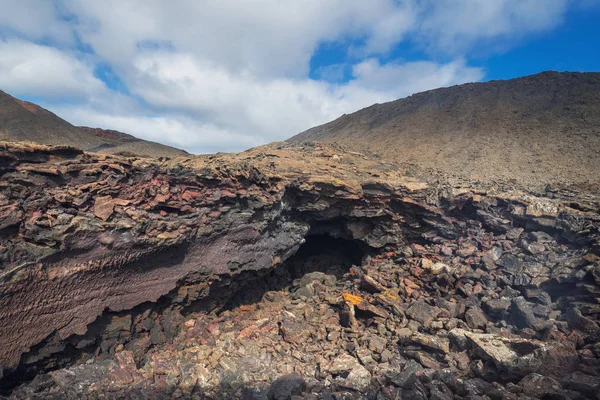 Úžasné sopečné krajiny. Geologické láva detail v Timanfaya national park, Lanzarote, Kanárské ostrovy, Španělsko. — Stock fotografie