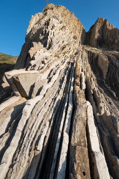 Estratos rocosos, detalle de fondo de textura geológica en Zumaia, País Vasco, España . —  Fotos de Stock