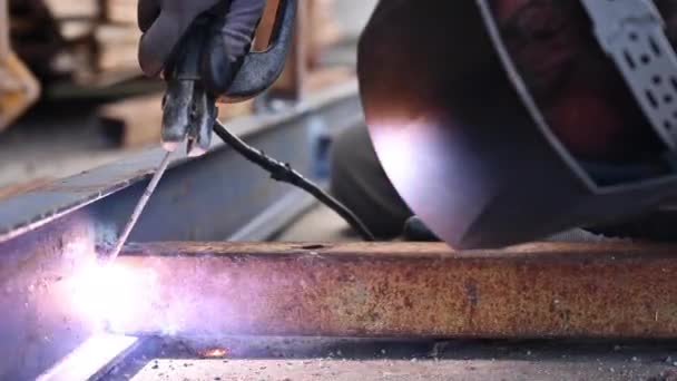 Close-up of the welding process of two metal parts. — Stock Video