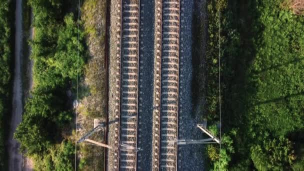 Flying over railway tracks, top view. — Stock Video