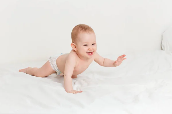 Caucasian Laughing Eight Month Old Baby Diaper Crawls Bed Happy — Stock Photo, Image