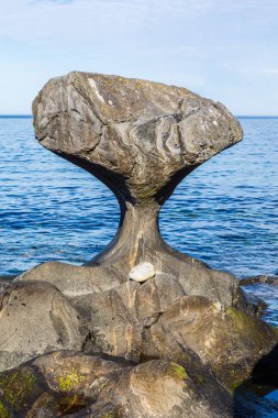  Kannesteinen is a special shaped stone located on the shore of  clipart