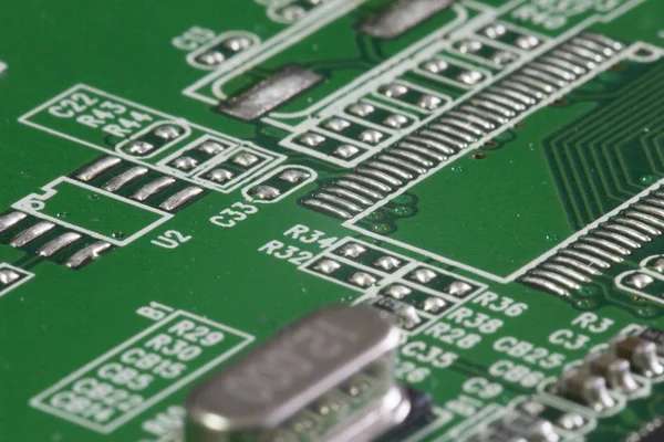 Vue macro avec nuances de circuits imprimés électroniques d'un disque dur — Photo