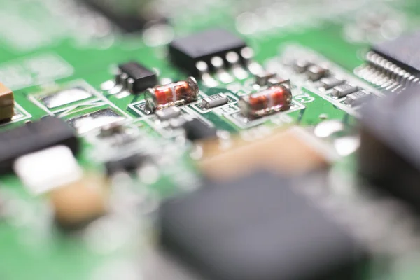 Vista macro com tons de placas de circuito impresso eletrônico de um HDD — Fotografia de Stock
