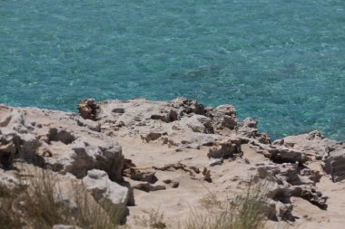 Ses Illetes plaj ve taşlar Formentera Beach