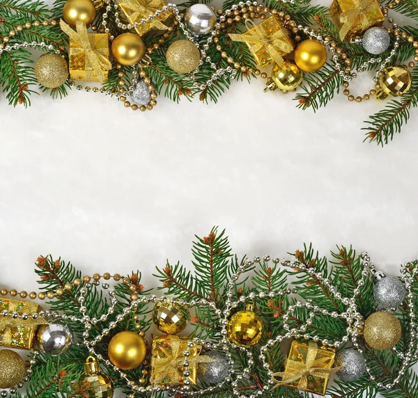 Christmas decorations on a spruce branch — Stock Photo, Image