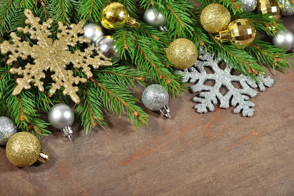 Christmas decorations and spruce branch — Stock Photo, Image