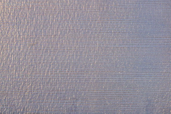 Фиолетовая прозрачная капроновая ткань в качестве фоновой текстуры — стоковое фото