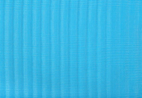 Blå plisserad transparent caprone tyg som bakgrund textur — Stockfoto