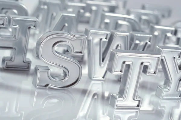 Bir beyaz gümüş alfabesi harfleri yakın çekim — Stok fotoğraf