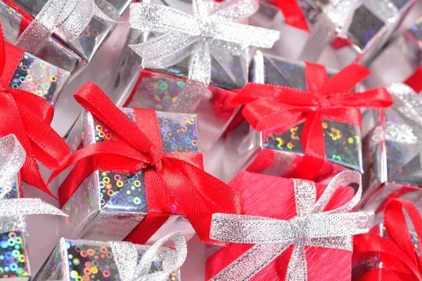 Top view of silver and red gifts close-up — Stock Photo, Image