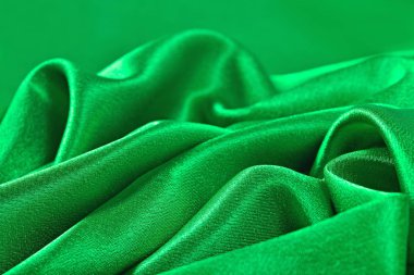 Doğal yeşil saten kumaş doku arka plan