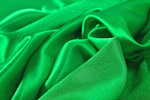 Doğal yeşil saten kumaş doku arka plan