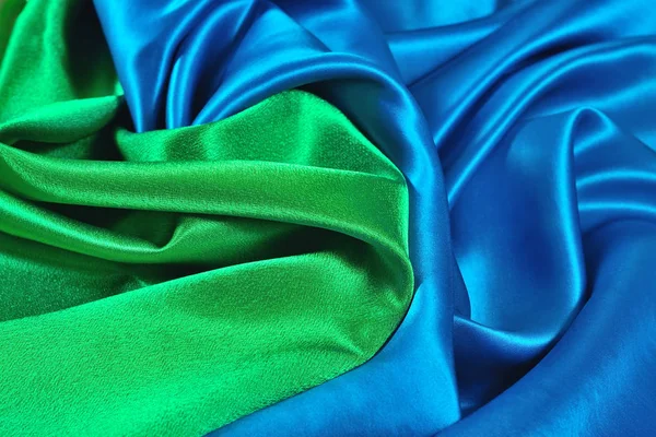 Natural blue and green satin fabric as background — Stock Photo, Image