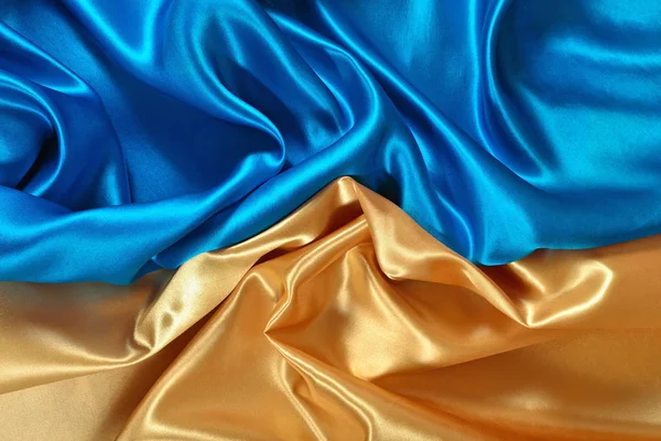 Натуральная золотистая и синяя ткань — стоковое фото