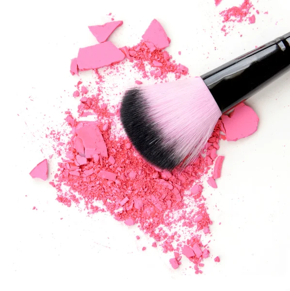 Makeup brush products with crushed eyeshadow pink makeup. — Stock Photo, Image