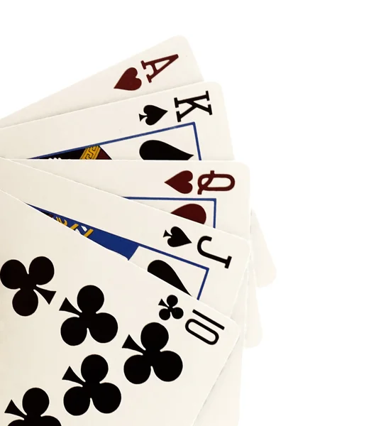Κοντινό πλάνο της πτώσης παιχνίδι καρτών πόκερ σε λευκό φόντο — Φωτογραφία Αρχείου