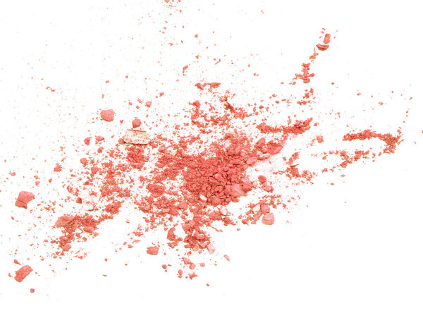 Orange eyeshadow crushed on white close up for background