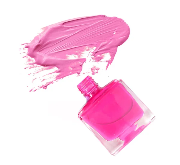 Esmalte de uñas rosa y pincel sobre fondo blanco —  Fotos de Stock