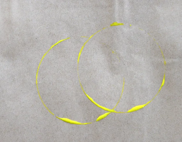 Yellow ring stain on paper background — Stock Photo, Image