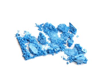Crushed makeup on white background. The eye shadows.
