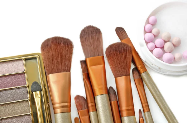 Cosmetics set with powder and make up brushes Stock Picture