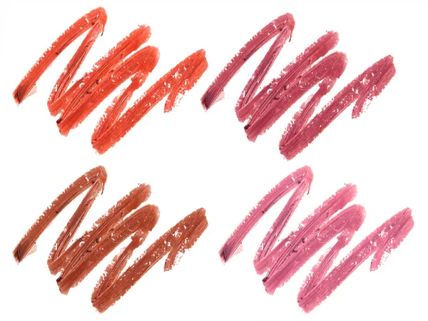 Collection of smudged lipsticks isolated on white — Stock Photo, Image