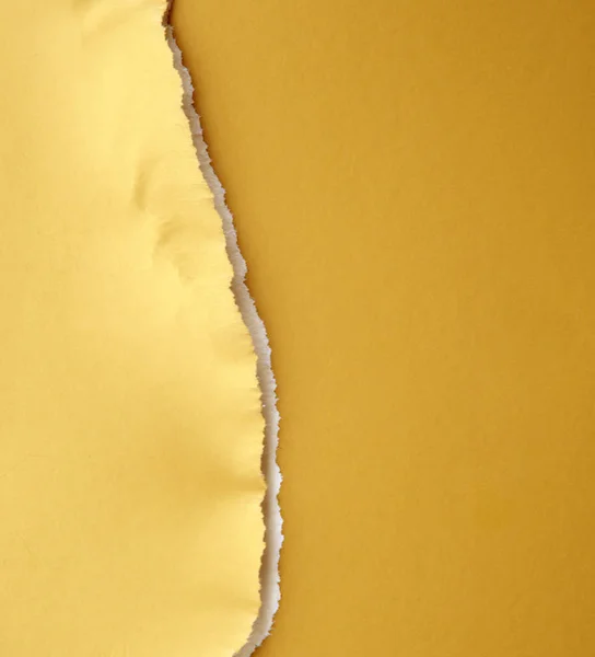 Zlatá slza papíru využití jako pozadí. — Stock fotografie