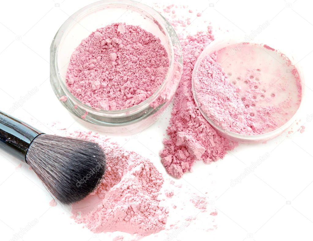 Cosmetic face powder on white and blush