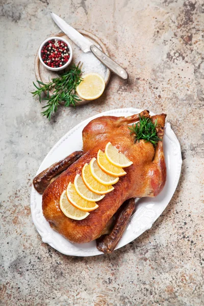 Roast duck with rosemary and citrus — Stock Photo, Image