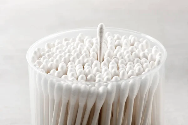 Cotton buds in a plastic container — Stock Photo, Image