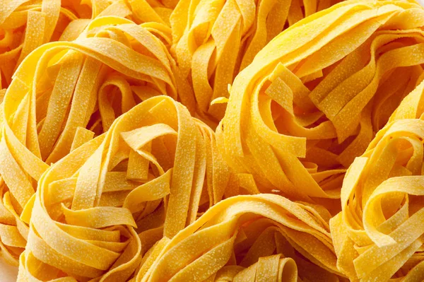 Detailní záběr z italských těstovin tagliatelle těstoviny — Stock fotografie