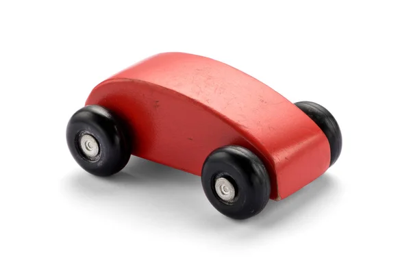 Coche de juguete de madera rojo estilizado simple —  Fotos de Stock