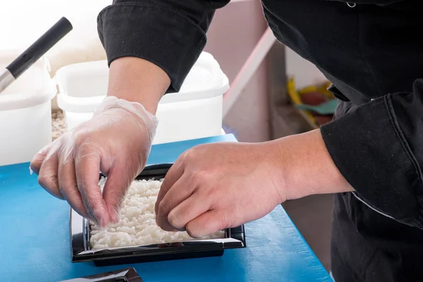 Chef preparing rice — Stock Photo, Image