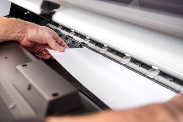 Adjusting paper in printer