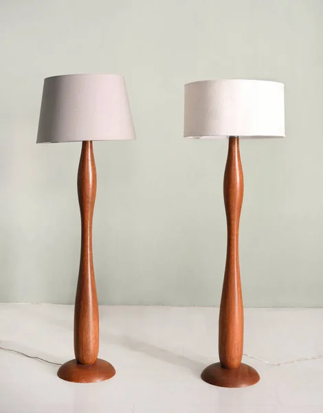 Pair of wooden floor or standing lamps — Stock Photo, Image