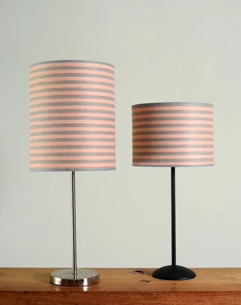 Two metal lamps with striped shades — Stock Photo, Image