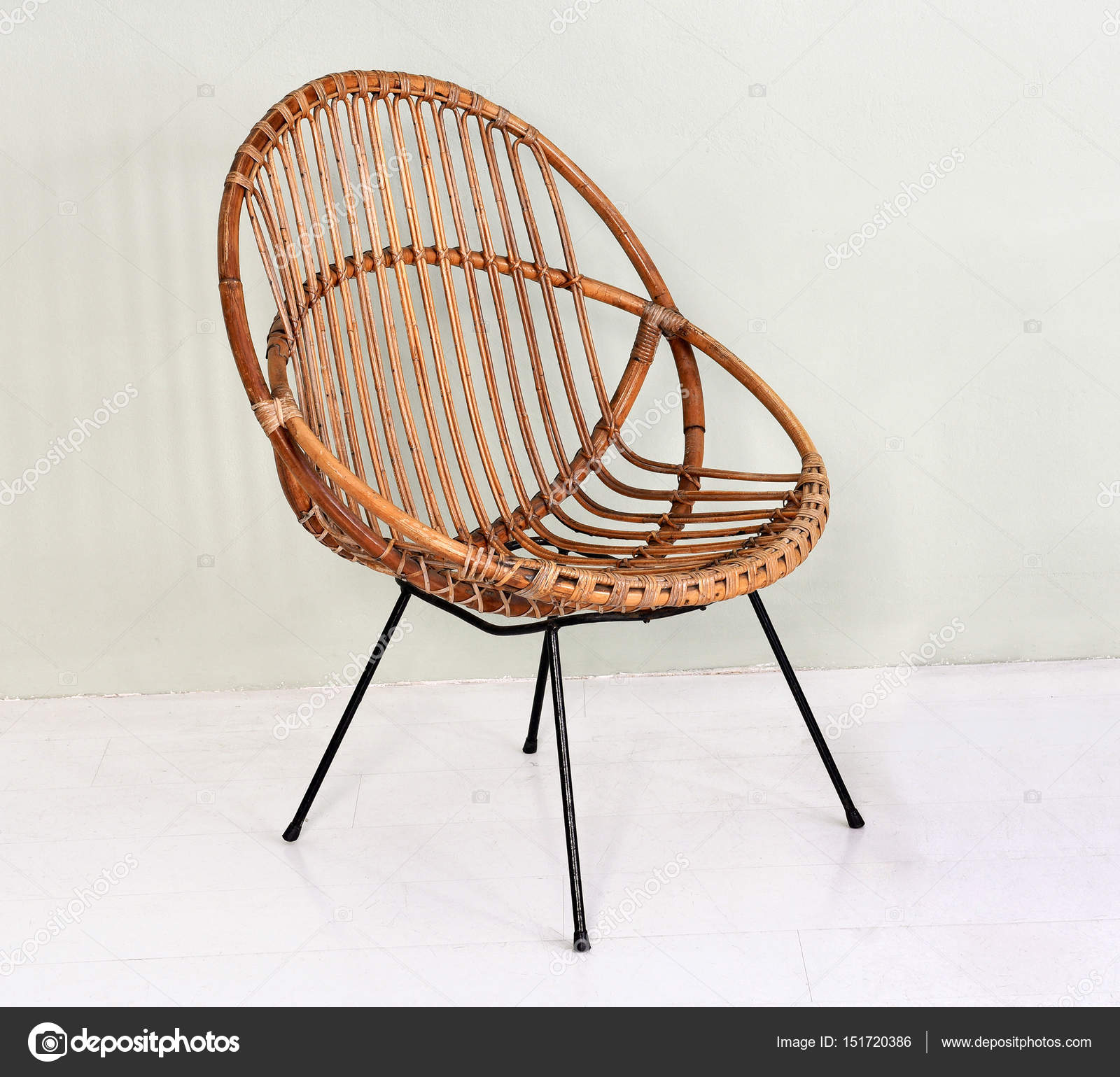 Comfortable Round Wicker Chair Stock Photo Photology1971 151720386 Comfortable Round Wicker Chair With Metal Legs Made Intertwined Willow Canes In An Interior Decor And Design Concept Photo By Photology1971