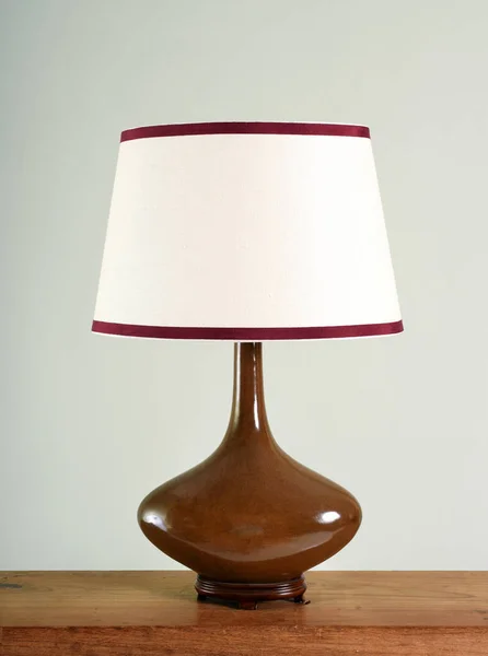 Elegant brown bulbous vintage lamp with shade — Stock Photo, Image